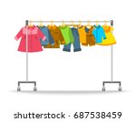 kids clothes on hanger rack.... | Shutterstock .eps vector #687538459