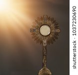 An Image Of A Golden Mostrance...