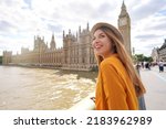 Happy young female tourist visiting London sights, United Kingdom