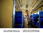 Small photo of BANGKOK, THAILAND – SEPTEMBER 3: The train ticket collector was collecting money from the passengers on September 3, 2020 in Bangkok, Thailand.