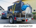 Small photo of Trailer with bulky waste from a household clearance