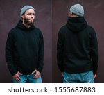 City portrait of handsome hipster man with beard wearing black blank hoodie or sweatshirt with space for your logo or design. Front and back view mockup of black hoodie