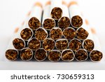 Small photo of cigarette, cigarette on white background, pack of cigarettes, close-up of a cigarette