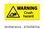 warning   crush hazard. sign ... | Shutterstock .eps vector #676336516