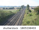 Small photo of The Midland main line near Desborough, East Midlands, with signalling for bidirectional running