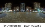 Small photo of full seamless spherical hdri night panorama 360 near skyscraper multistory buildings of residential quarter with light in windows in equirectangular projection