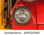 Classic red car headlights.old car wallpaper and backgruond.