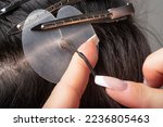 Hot hair extensions on micro capsules. Italian hair extension technology.