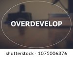 Small photo of Overdevelop with business blurring background