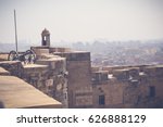 Small photo of cairo, egypt, april 22, 2017: cityscape background from cairo citadel with view of ordnance, ramadan concept background