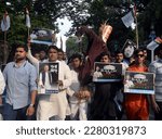 Small photo of Congress activists take part in a demonstration to protest against disqualification Rahul Gandhi from Lok Sabha on March 25,2023 in Calcutta, India.