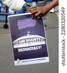 Small photo of Congress activists hold poster during a demonstration to protest against disqualification Rahul Gandhi from Lok Sabha on March 25,2023 in Calcutta, India.