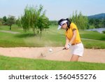 Woman Golfer Hit Sand Ground...