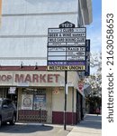 Small photo of LOS ANGELES, April 26th, 2022: Wild Card Gym Hollywood. Sign at the strip mall at Vine Street where the gym is located. Freddie Roach, Manny Pacquiao's trainer, owns the famous boxing gym.