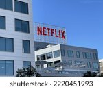 Small photo of LOS ANGELES, Oct 24th, 2022: Netflix logo on top of their Hollywood corporate office building on a sunny day against a blue sky. Their Los Angeles offices are located on 1375 Vine Street.