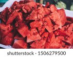 Small photo of Close up of healthy sliced watermelon on white tray, with loads of enzymes for good digestion. Selective focus.