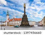Panorama of the Square and the Holy Trinity Column in Olomouc, Czech Republic under beautiful cloudy sky