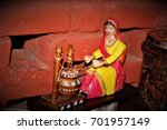 Small photo of butter churning women