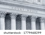 Small photo of inscription on the courthouse close-up in monochrome blue tonality