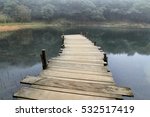 Small Pier On A Lake