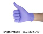 hand of surgeon with a blue... | Shutterstock . vector #1673325649