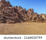 Small photo of Strange stone mountains in the Sinai desert near Sharm El Sheikh, Egypt. Martian landscape. Background with copy space