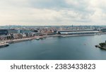 Small photo of Amsterdam, Netherlands. Amsterdam Central Station. Amsterdam Centraal - The largest train station in the city, built in 1889. Bay IJ (Amsterdam), Aerial View