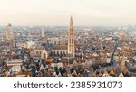 Small photo of Antwerp, Belgium. Spire with the clock of the Cathedral of Our Lady (Antwerp). Historical center of Antwerp. City is located on river Scheldt (Escaut). Summer morning, Aerial View