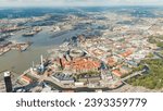 Small photo of Gothenburg, Sweden. River Gota Alv and Rosenlund Canal. Panoramic view of the central part of the city. Summer day. Cloudy weather, Aerial View