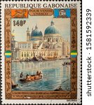 Small photo of MINSK, BELARUS - December 6, 2019: a stamp Gabonese Republic (Republique Gabonaise - IL BACINO VERSO IL CANAL GRANDE - Luigi Vanvitelli)