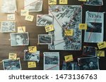Small photo of Detective board with photos of suspected criminals, crime scenes and evidence with red threads, retro toned