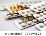 Different medicines: tablets, pills in blister pack, medications drugs, macro, selective focus, copy space