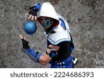 Small photo of Lucca, Tuscany, Italy - November 1, 2022: Cosplayer dressed as Sub-Zero, character from the video game series Mortal Kombat at the Lucca Comics and Games 2022 cosplay event.