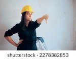 Small photo of Displeased Woman Doing Repairing and Construction Work. Female worker doing manual labor feeling unhappy and appalled