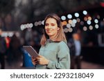 Small photo of Music Festival Organizer Wearing a Headset Holding a Pc Tablet. Confident public relations specialist hosting a concert event