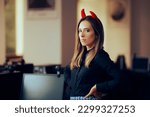 Small photo of Mean Boss Wearing Devil Horns in the Office with Condescending Attitude. Toxic manager being condescending and oppressive