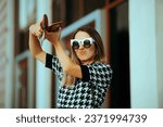 Small photo of Rich Woman Throwing Money from her Wallet. Wealthy girl flaunting her cash emptying her purse