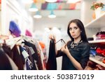 Woman Checking Price Tag on Sale in Clothing Store - Fashion girl surprised by an expensive dress
