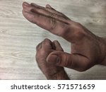 Small photo of Man hands. Gestures swearword in Arabic countries