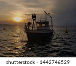 Fishing Boat Anchored On The...