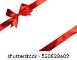red ribbon bow isolated on... | Shutterstock . vector #520828609
