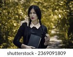 Girl with long black hair in...