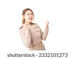 Small photo of Female Thai government officer in khaki uniforms smiling. Beautiful woman doing winner gesture with arms raised isolated over white background. Concept of success in work, welfare, credit approval.