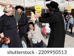 Small photo of Ultra-Orthodox Jews perform the Kaparot ritual, white chickens are slaughtered, symbolic gesture of a Yom Kippur, Jewish Day of Atonement, in Israeli city of Beit Shemesh on October 2, 2022.