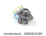 Close up of washing machine water inlet valve on white background, isolated, Home appliances repair service.