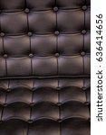 Small photo of Leather Surface of Black Sofa Chair, Buttons on the Rexine