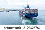 Small photo of stern Cargo container Ship in the ocean sea concept logistic transportation export to customs forwarding logistics service. Container on Bulk ship.cargo container ship carrying container