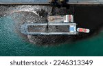 Small photo of Pumping oil to Bulk Ship. Oil leak from Ship , Oil spill pollution polluted water surface water pollution as a result of human activities. industrial chemical contamination. oil spill at sea.