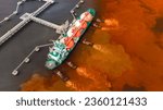 Small photo of Oil leak from Ship , Oil spill pollution polluted water surface water pollution as a result of human activities. industrial chemical contamination. oil spill at sea. petroleum products.