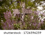 Stone Cross With Jesus In The...